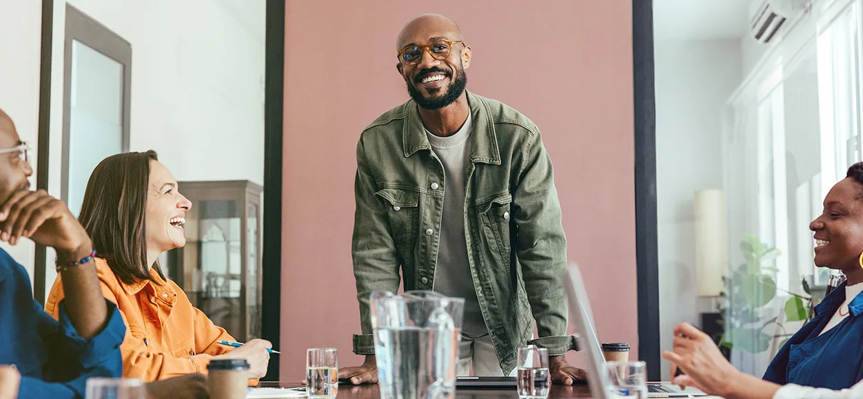 man standing at office table