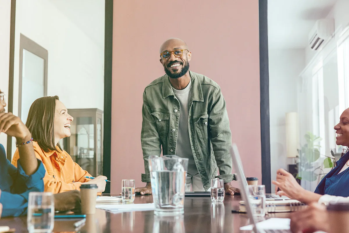 man standing at office table